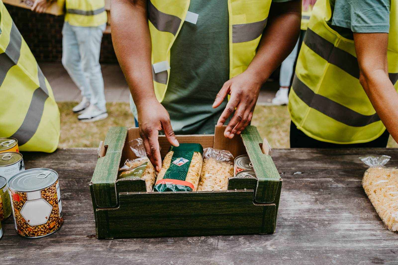 Workers receiving packaged food